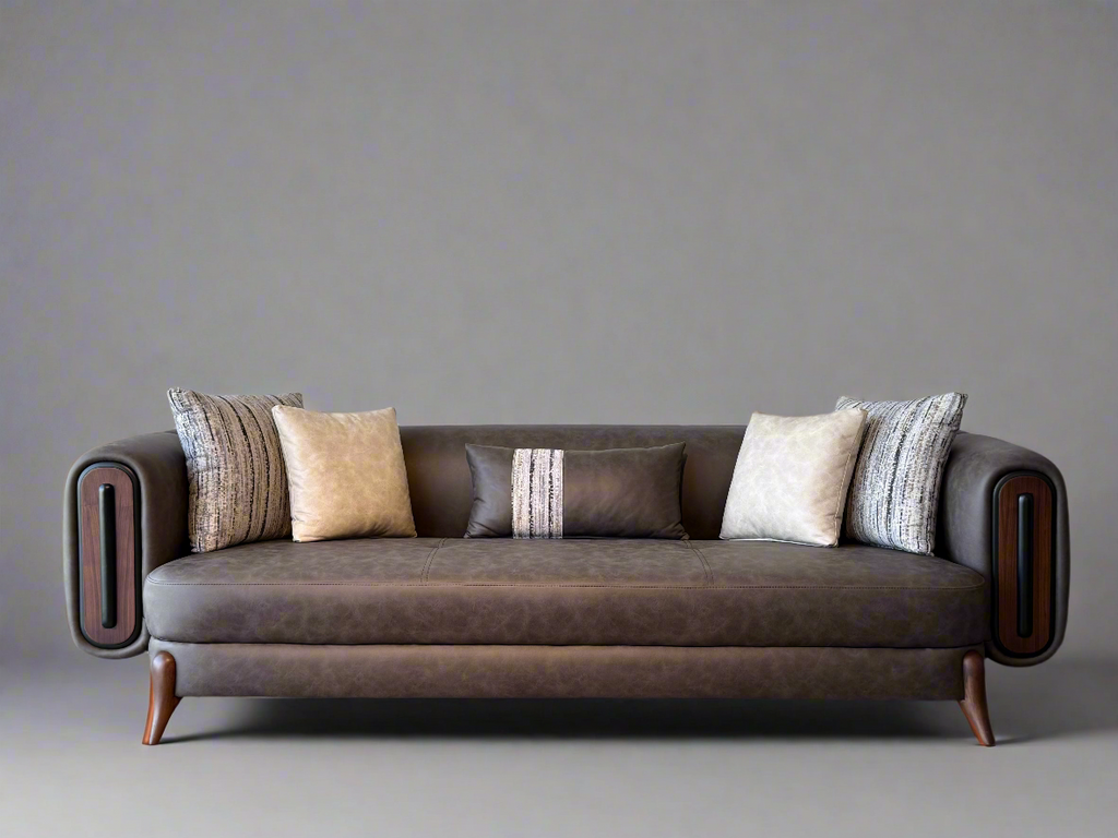 Brown sofa with patterned cushions in a living room setting.